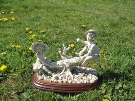 Vintage Capodimonte Porcelain Boy and girl sitting on a tree Joy White Figurine Seesaw