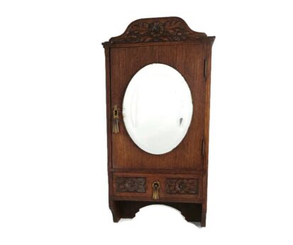 Gorgeous Medicine Apothecary Cabinet Oval beveled glass mirror hand carved wood