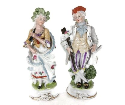 two statue figurines hunt Man Lady blowing Horn porcelain hand painted porcelain vtg marked