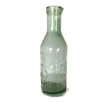 green glass milk bottle absolutely pure milk vintage 