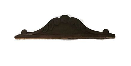 small dark wooden hand carved antique pediment trim over door reclaimed architectural