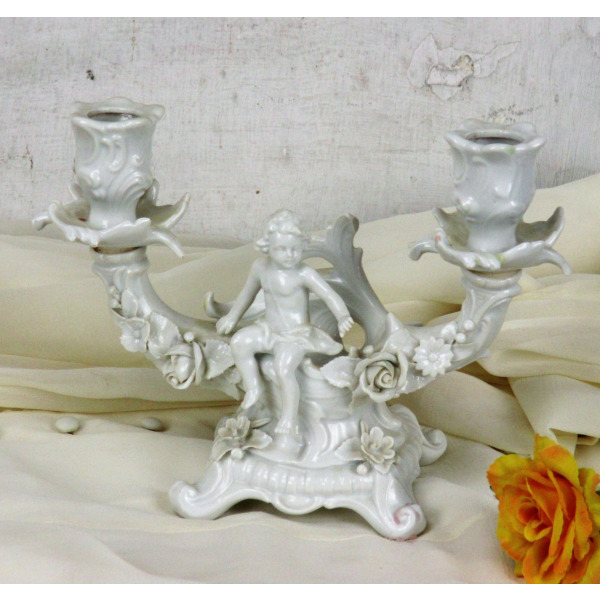 Late 19th Century Porcelain Cherub Candle Holders - a Pair